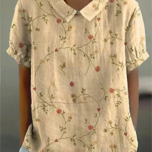 Elégant top pour femmes avec de belles broderies florales - manches courtes élégantes pour un look décontracté