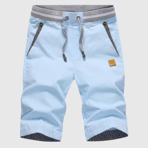 Shorts décontractés pour hommes avec cordon à la taille, poches zippées et coupe ample jusqu'au genou